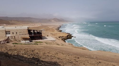 Scenic view of beach against sky