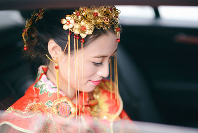 Young woman holding bouquet