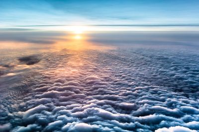 Scenic view of sea against cloudy sky