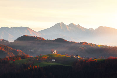 Scenic view of mountains against sky during sunset