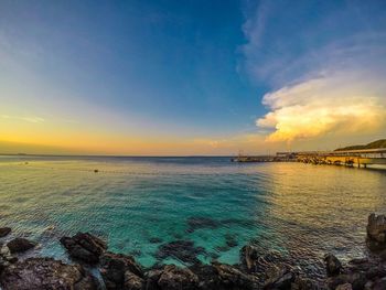 Scenic view of sea against sky during sunset