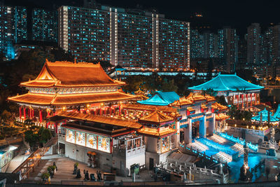 High angle view of illuminated buildings at night