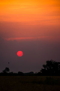 Scenic view of silhouette trees against sky during sunset