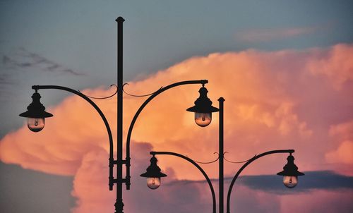 Lanterns on sunset clouds background in sopot