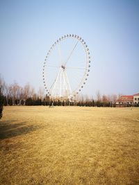 Ferris wheel against clear sky