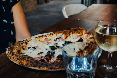 Close-up of pizza in plate on table