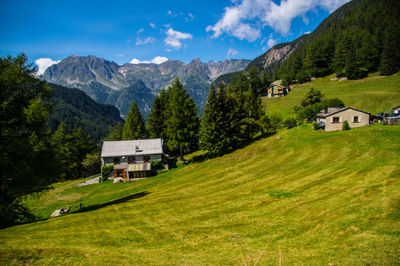 Scenic view of landscape and mountains against sky