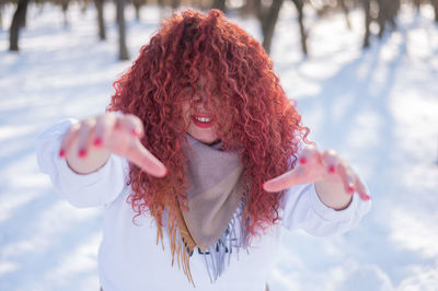 Portrait of woman with curly hair