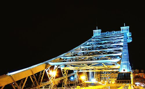 Low angle view of bridge at night