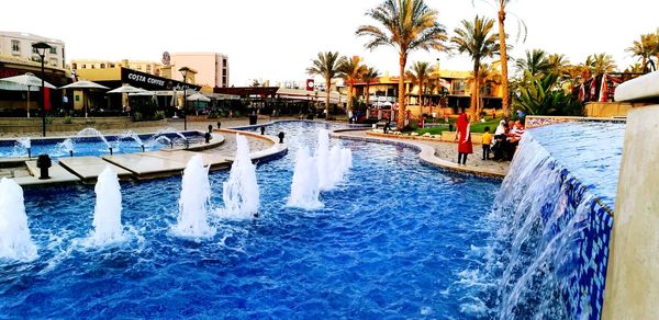 View of swimming pool against clear sky