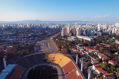 High angle view of city buildings against sky