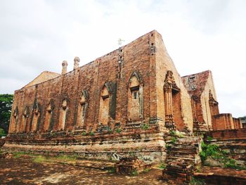 Low angle view of old building against sky