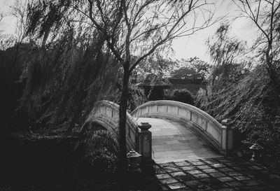 Bridge over park against sky