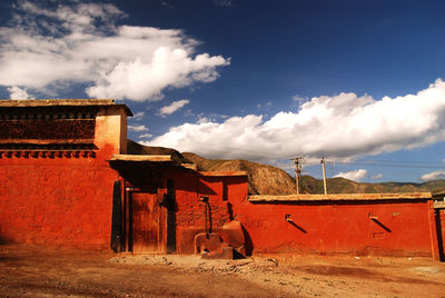 Abandoned building against sky