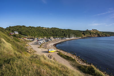 View at hammershus castle ruin from hammeren harbour, bornholm, denmark