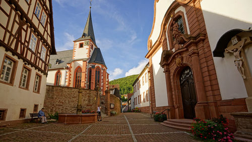 View of buildings against sky in city