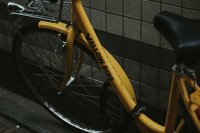 High angle view of yellow bicycle