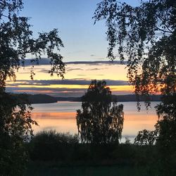 Scenic view of lake during sunset