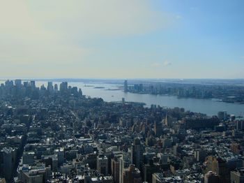 High angle view of buildings in city against sky