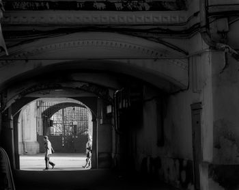 View of people walking on tiled floor