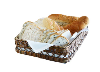 Close-up of wicker basket on white background