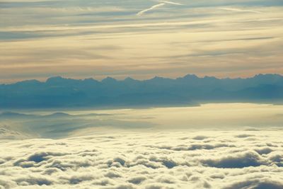 Scenic view of mountains against sky during sunset