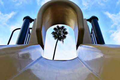 Low angle view of palm tree seen from slide