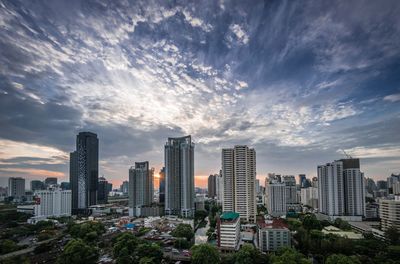 Modern buildings in city against sky