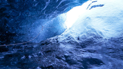 Close-up of frozen sea against sky