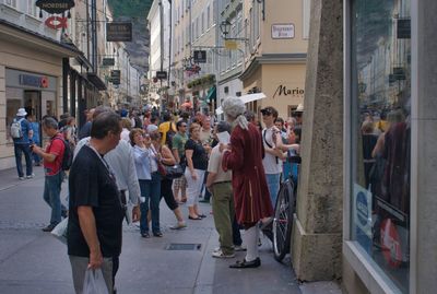 People walking on street in city