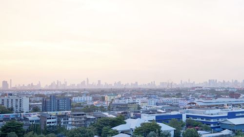 High angle view of buildings in city against sky