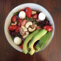 High angle view of chopped vegetables in bowl on table