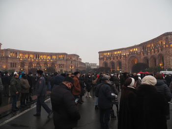 Group of people in front of historical building