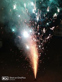 Firework display at night