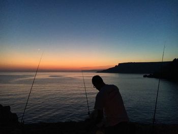 Scenic view of sea at sunset