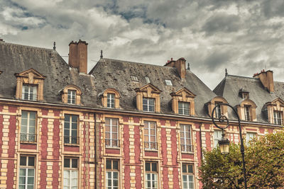 Low angle view of residential building against sky