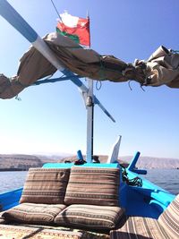 Seat in boat against sky