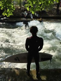 Full length of woman in water