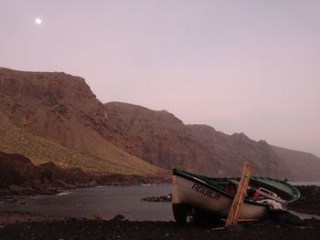 Scenic view of sea against clear sky during sunset