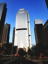 Low angle view of buildings against sky in city