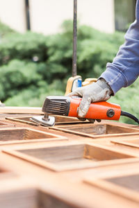 Close-up of worker working at construction site