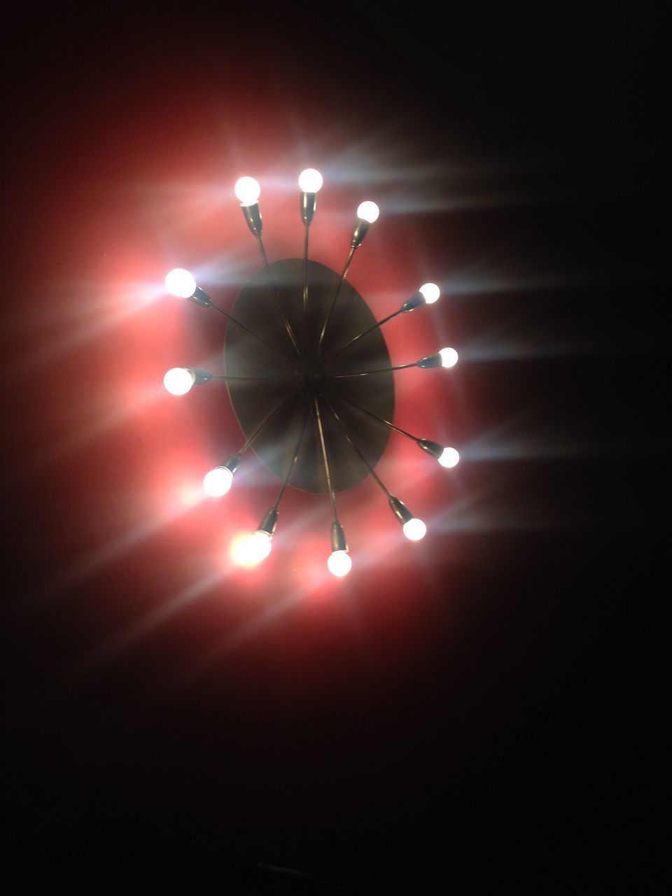 LOW ANGLE VIEW OF ILLUMINATED ELECTRIC LAMP