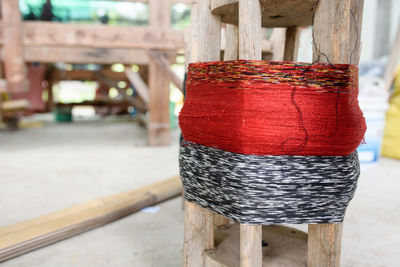 Close-up of red container on table