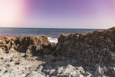 Scenic view of sea against clear sky