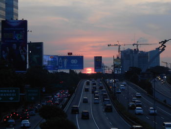 High angle view of traffic on road at sunset