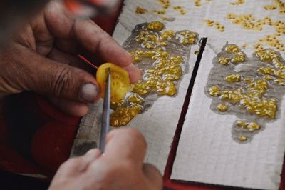 Midsection of person preparing food