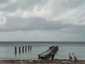 Scenic view of calm sea against sky