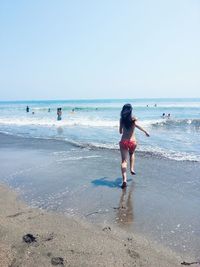 People enjoying at beach