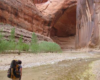 People standing on rock formation