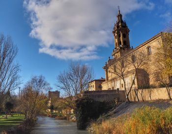 View of church and building against sky